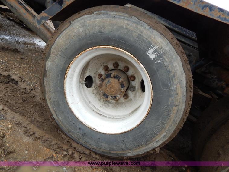 image for item G3117 1988 Ford L8000 roll off truck