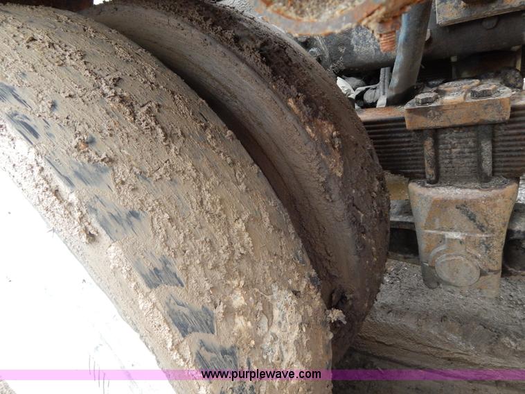 image for item G3117 1988 Ford L8000 roll off truck