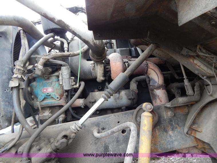 image for item G3117 1988 Ford L8000 roll off truck