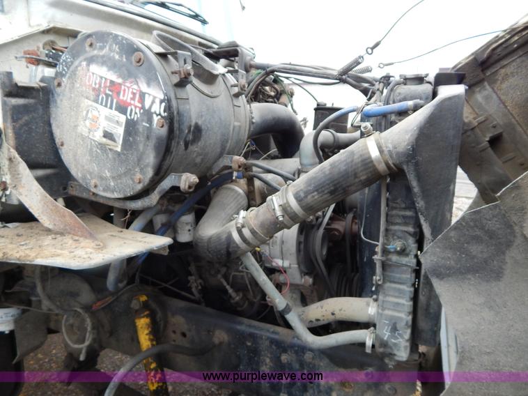 image for item G3117 1988 Ford L8000 roll off truck