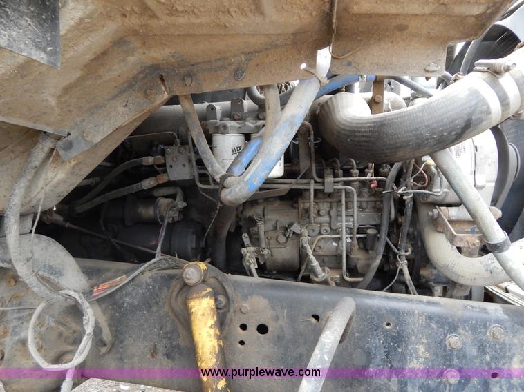 image for item G3117 1988 Ford L8000 roll off truck