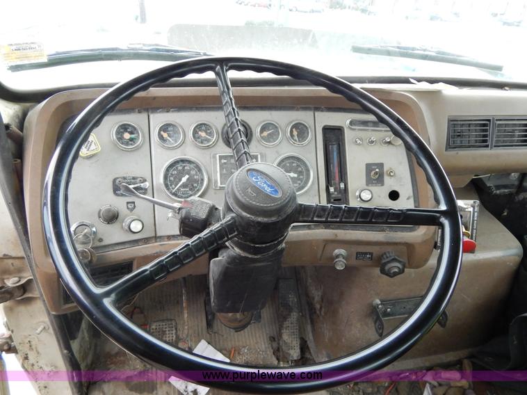 image for item G3117 1988 Ford L8000 roll off truck