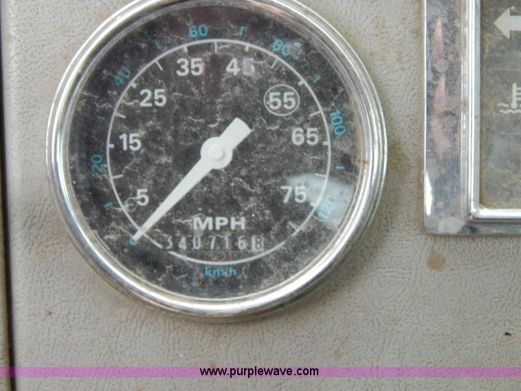 image for item G3117 1988 Ford L8000 roll off truck