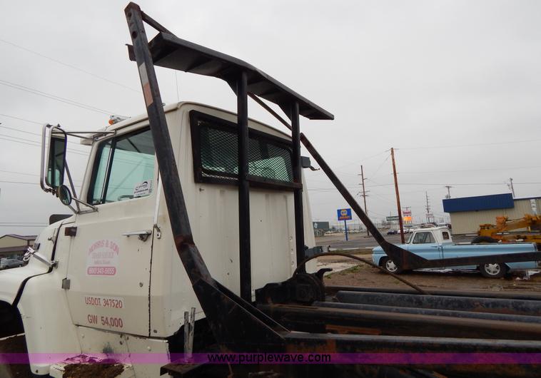 image for item G3117 1988 Ford L8000 roll off truck