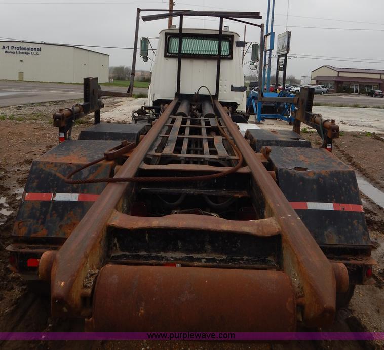 image for item G3117 1988 Ford L8000 roll off truck