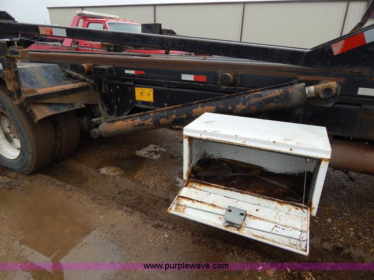 image for item G3117 1988 Ford L8000 roll off truck