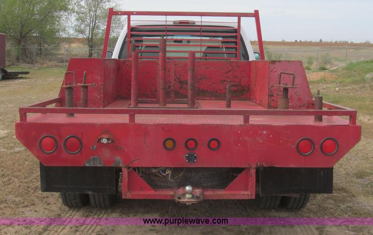 image for item G5683 2004 Ford F350 XL Crew Cab flatbed truck