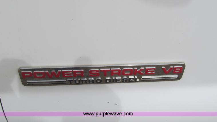 image for item G5683 2004 Ford F350 XL Crew Cab flatbed truck