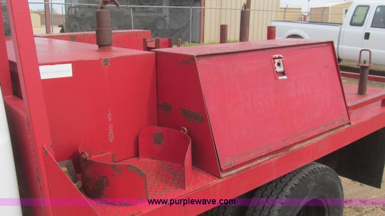 image for item G5683 2004 Ford F350 XL Crew Cab flatbed truck