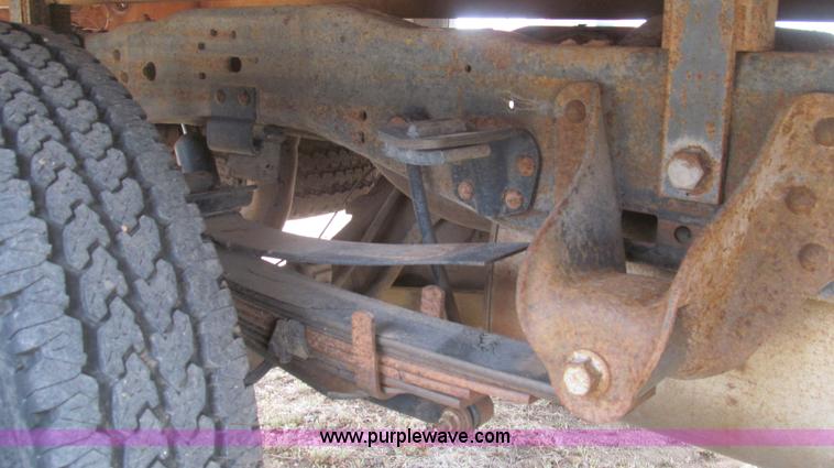 image for item G5683 2004 Ford F350 XL Crew Cab flatbed truck