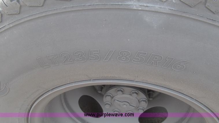 image for item G5683 2004 Ford F350 XL Crew Cab flatbed truck