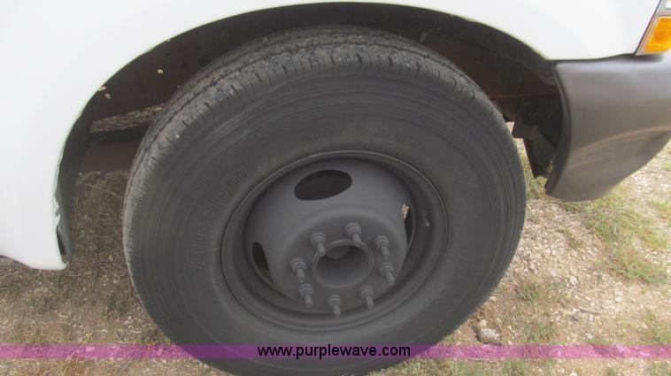 image for item G5683 2004 Ford F350 XL Crew Cab flatbed truck