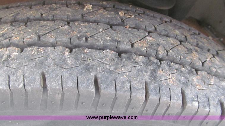 image for item G5683 2004 Ford F350 XL Crew Cab flatbed truck