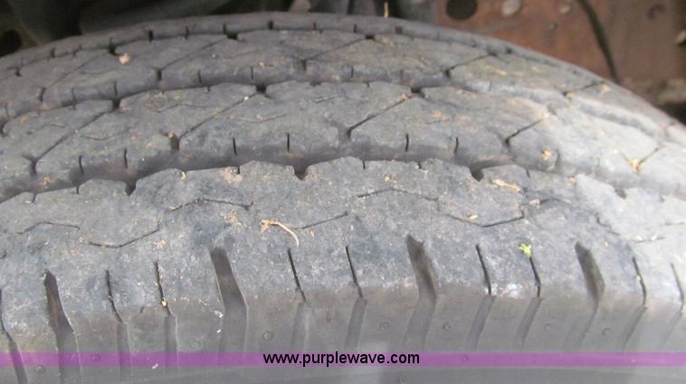 image for item G5683 2004 Ford F350 XL Crew Cab flatbed truck