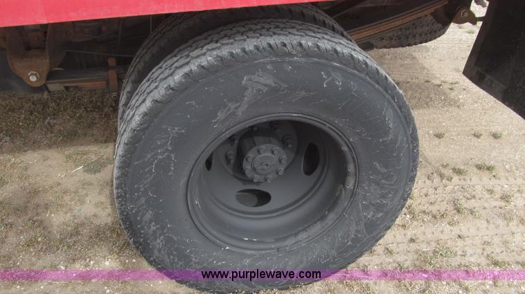 image for item G5683 2004 Ford F350 XL Crew Cab flatbed truck