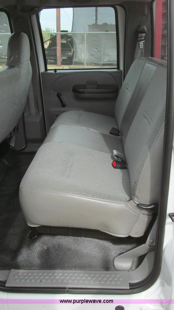 image for item G5683 2004 Ford F350 XL Crew Cab flatbed truck