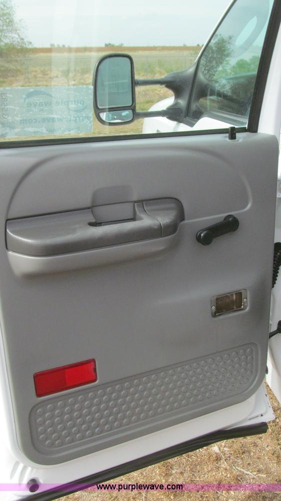 image for item G5683 2004 Ford F350 XL Crew Cab flatbed truck