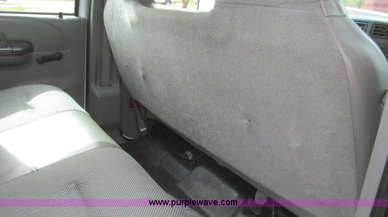 image for item G5683 2004 Ford F350 XL Crew Cab flatbed truck