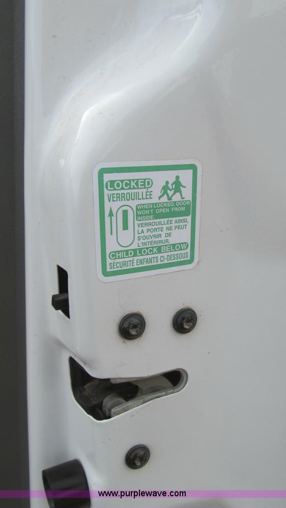 image for item G5683 2004 Ford F350 XL Crew Cab flatbed truck