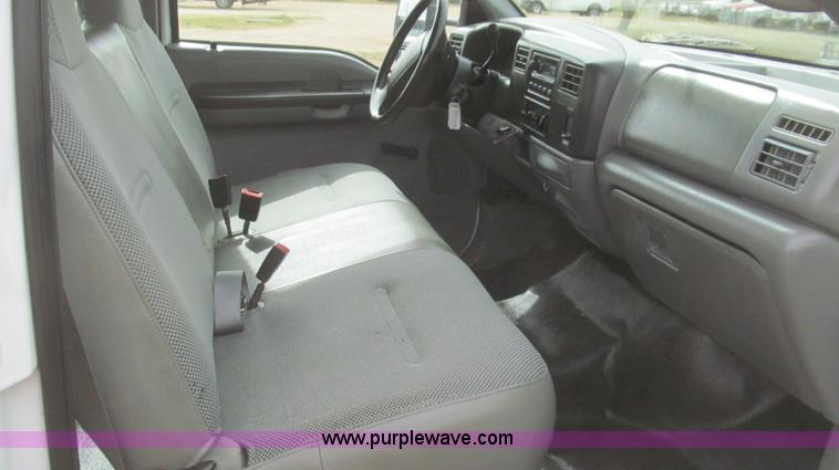 image for item G5683 2004 Ford F350 XL Crew Cab flatbed truck