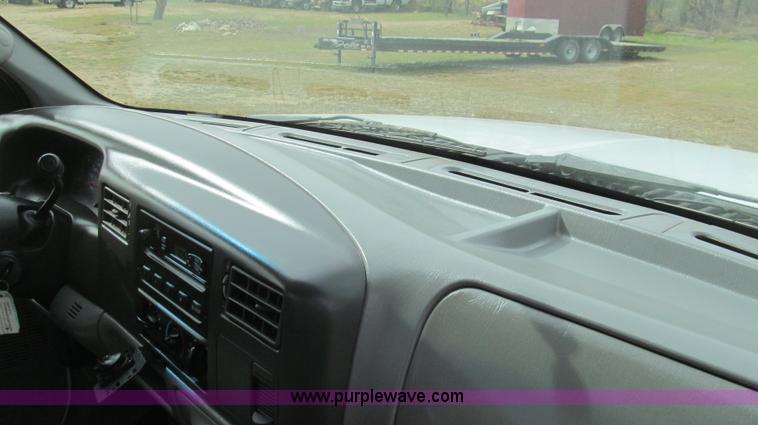 image for item G5683 2004 Ford F350 XL Crew Cab flatbed truck