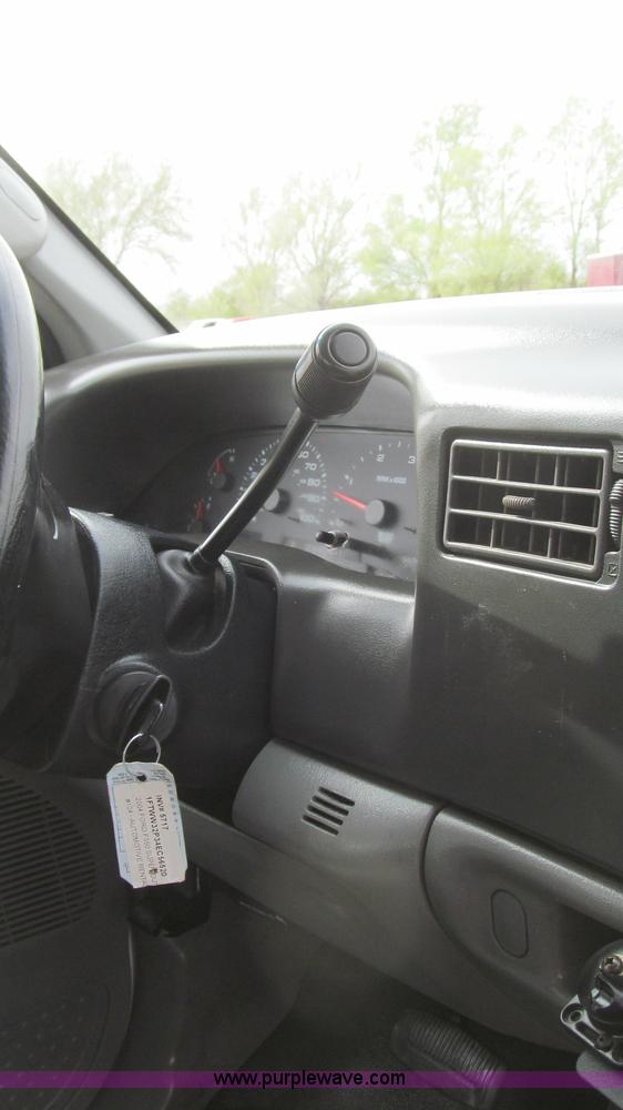 image for item G5683 2004 Ford F350 XL Crew Cab flatbed truck