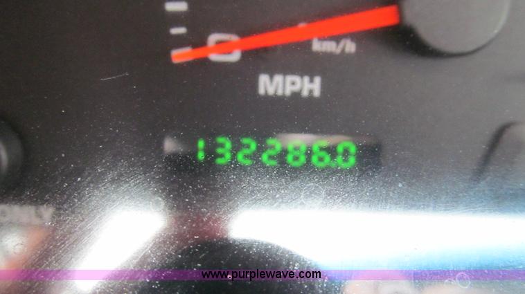 image for item G5683 2004 Ford F350 XL Crew Cab flatbed truck