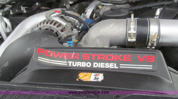 image for item G5683 2004 Ford F350 XL Crew Cab flatbed truck