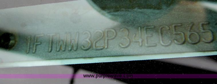 image for item G5683 2004 Ford F350 XL Crew Cab flatbed truck