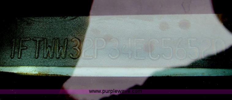 image for item G5683 2004 Ford F350 XL Crew Cab flatbed truck