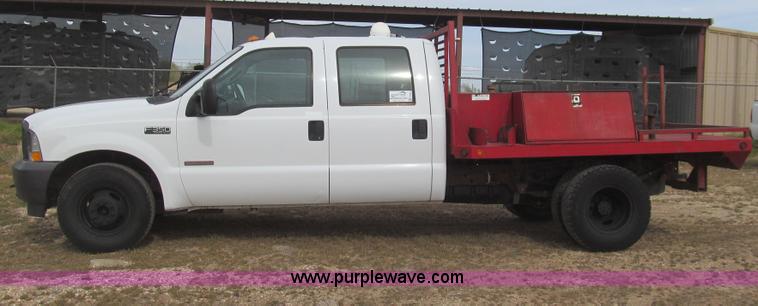image for item G5684 2004 Ford F350 Crew Cab flatbed truck