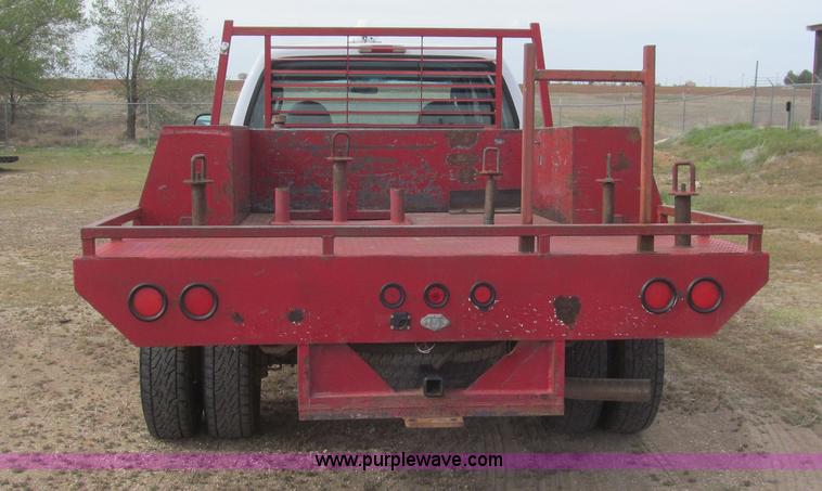 image for item G5684 2004 Ford F350 Crew Cab flatbed truck