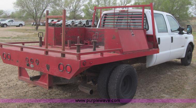 image for item G5684 2004 Ford F350 Crew Cab flatbed truck