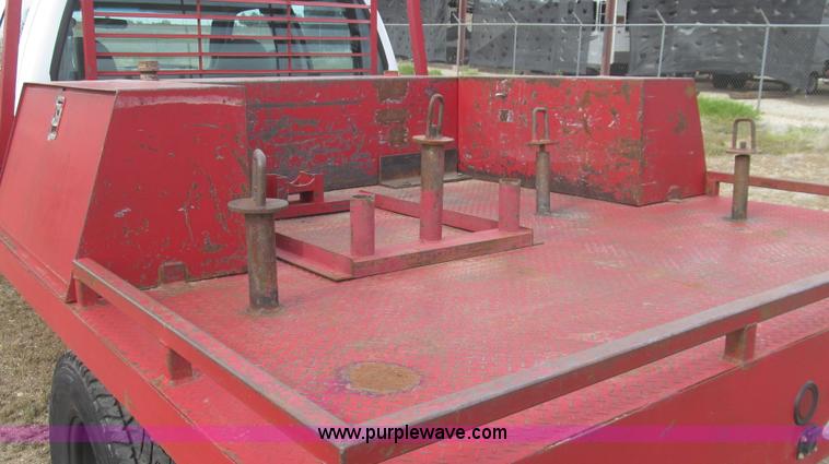 image for item G5684 2004 Ford F350 Crew Cab flatbed truck