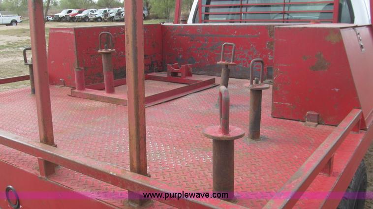 image for item G5684 2004 Ford F350 Crew Cab flatbed truck