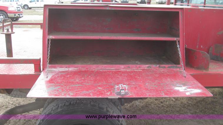 image for item G5684 2004 Ford F350 Crew Cab flatbed truck