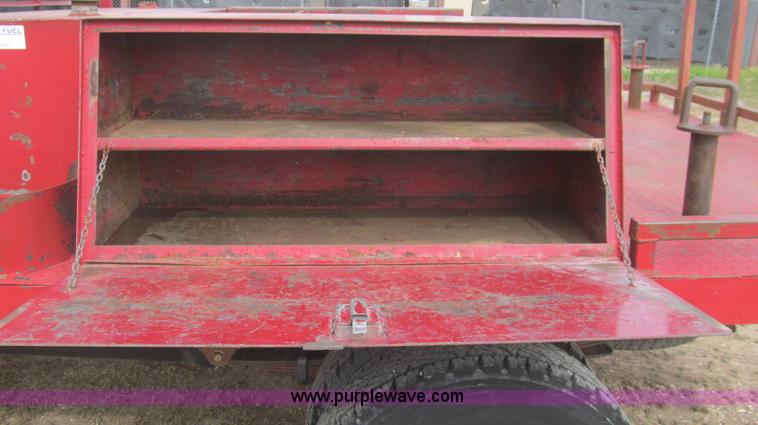 image for item G5684 2004 Ford F350 Crew Cab flatbed truck