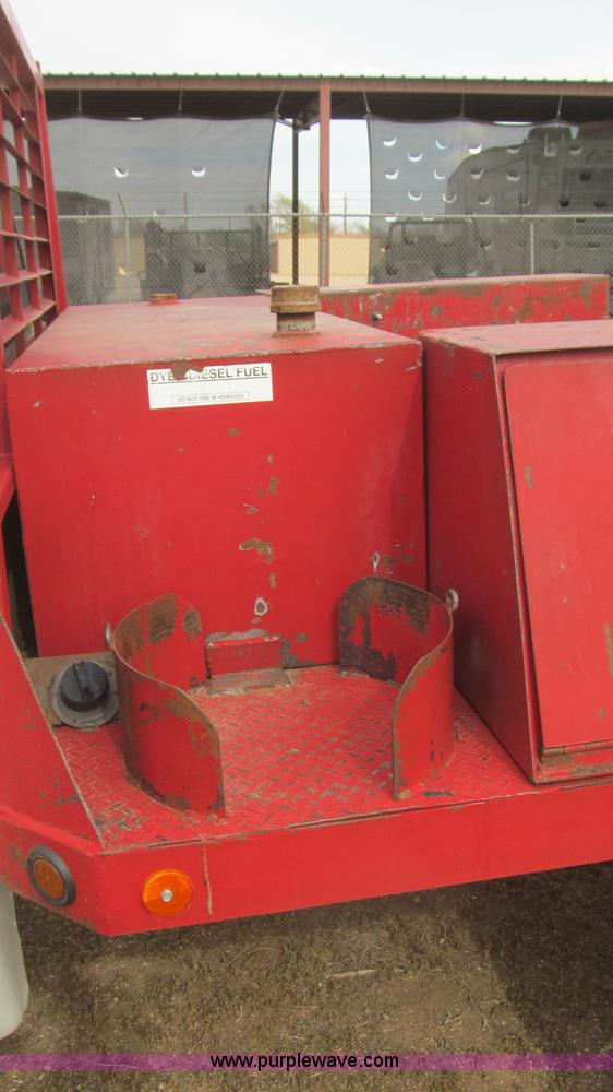 image for item G5684 2004 Ford F350 Crew Cab flatbed truck