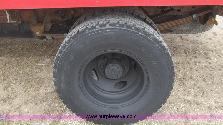 image for item G5684 2004 Ford F350 Crew Cab flatbed truck