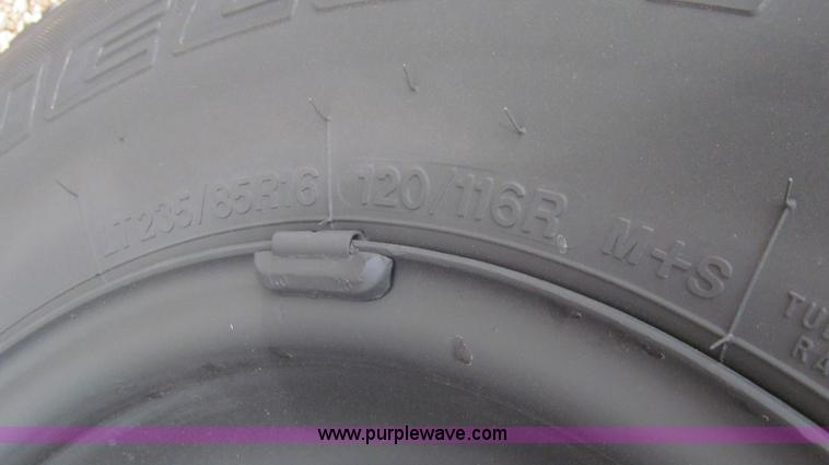 image for item G5684 2004 Ford F350 Crew Cab flatbed truck