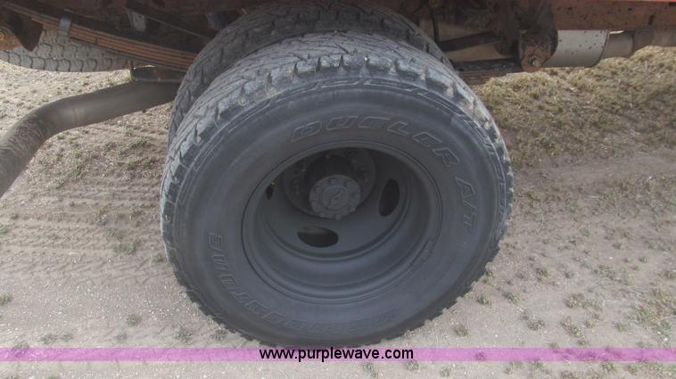 image for item G5684 2004 Ford F350 Crew Cab flatbed truck