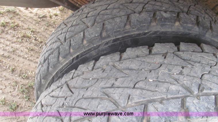 image for item G5684 2004 Ford F350 Crew Cab flatbed truck