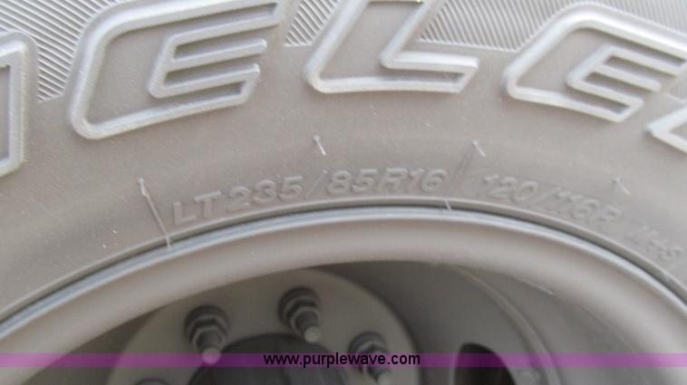 image for item G5684 2004 Ford F350 Crew Cab flatbed truck