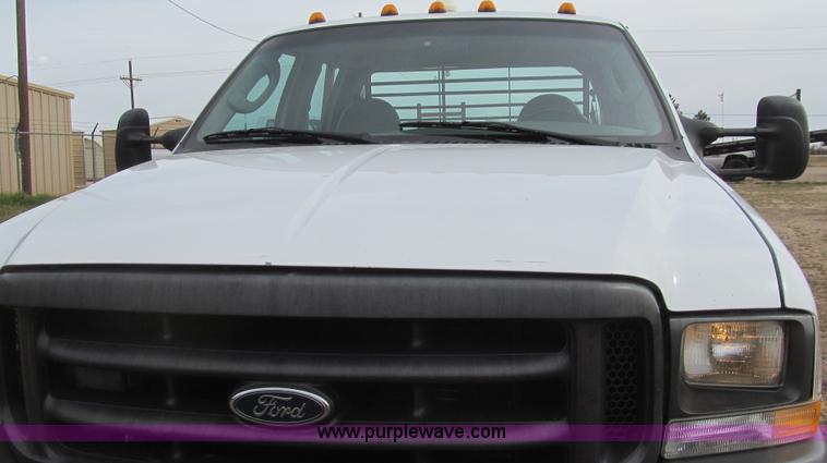 image for item G5684 2004 Ford F350 Crew Cab flatbed truck