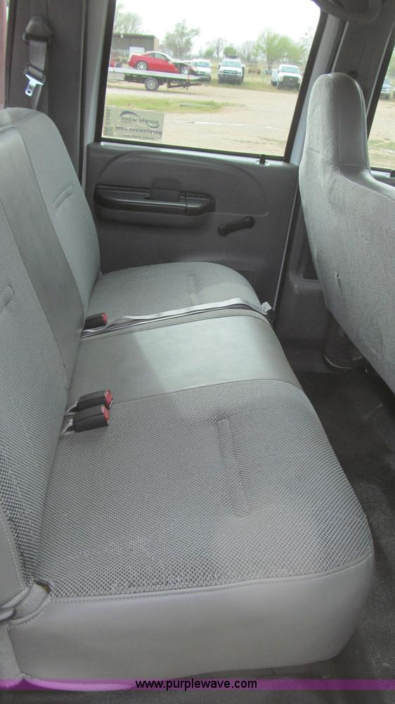 image for item G5684 2004 Ford F350 Crew Cab flatbed truck