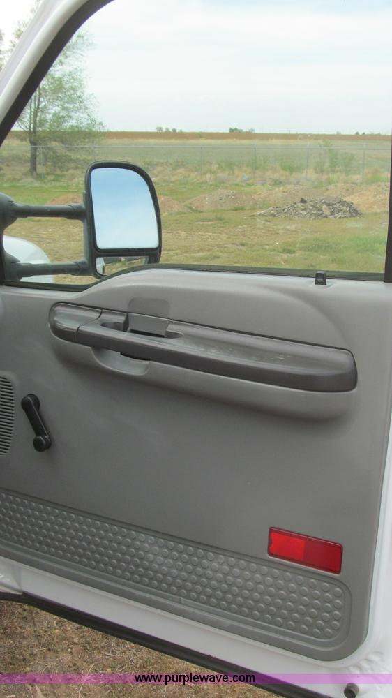 image for item G5684 2004 Ford F350 Crew Cab flatbed truck