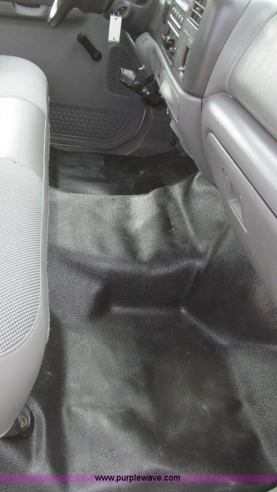 image for item G5684 2004 Ford F350 Crew Cab flatbed truck