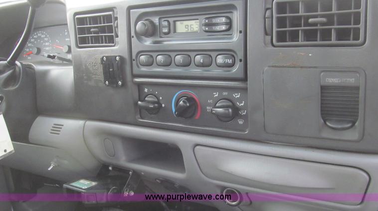 image for item G5684 2004 Ford F350 Crew Cab flatbed truck