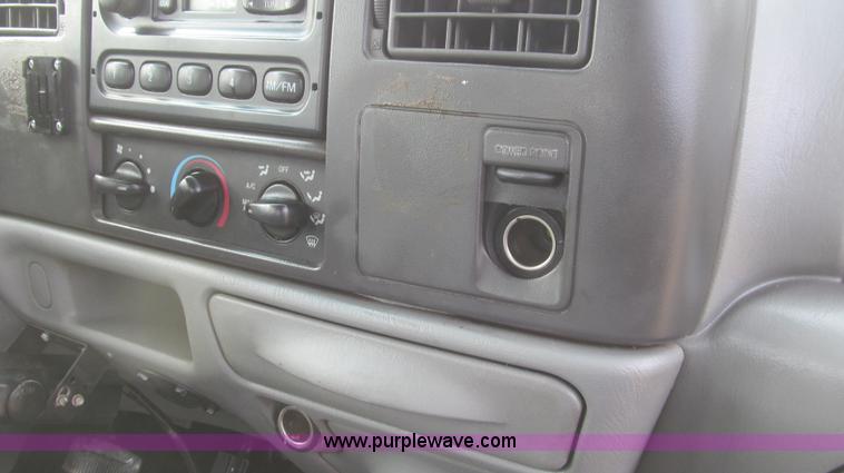 image for item G5684 2004 Ford F350 Crew Cab flatbed truck