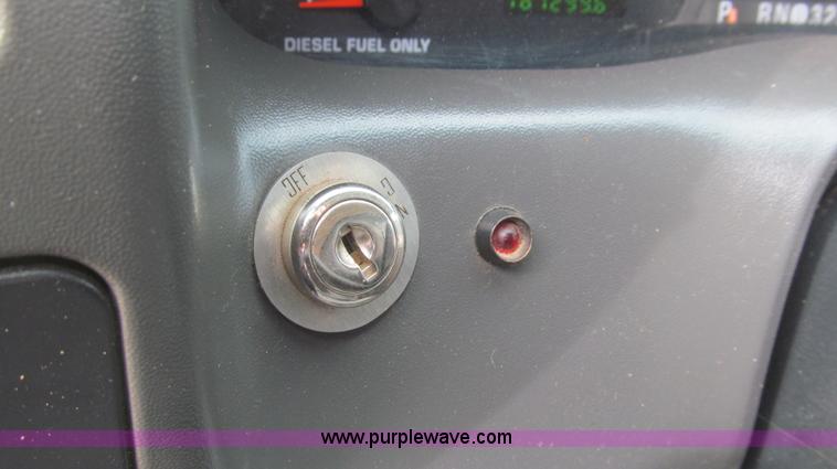 image for item G5684 2004 Ford F350 Crew Cab flatbed truck